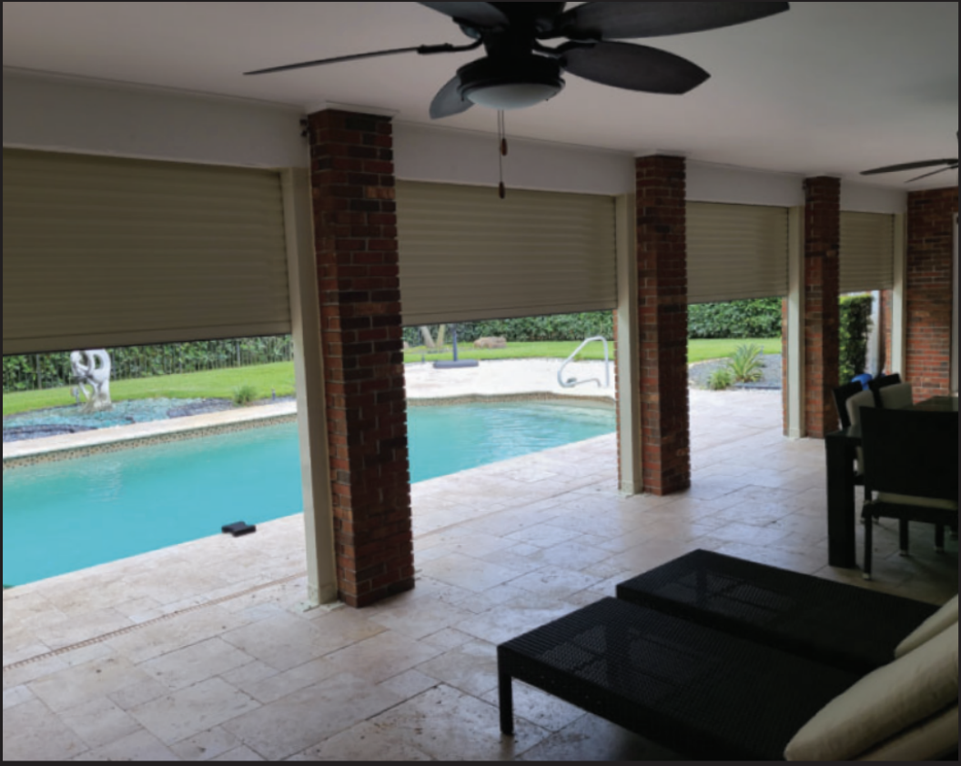 Roll down shutters on pool deck with brick columns